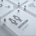a close up of a restroom sign on a wall - Photo #8