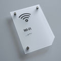 a white sign with a wifi symbol on it - Photo #4