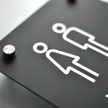 a close up of a black sign with white lettering - Photo #8