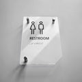 a restroom sign on a white wall - Photo #12