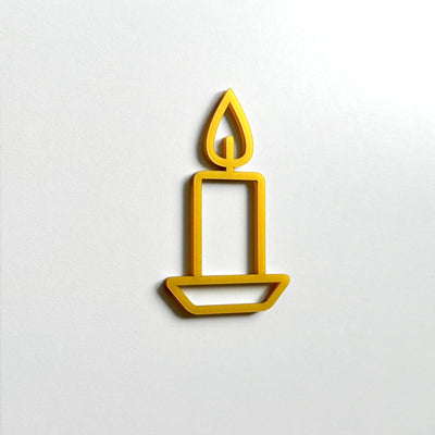 A simple gold candle icon is displayed against a white background.