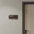 a sign on a wall next to a door, with the sign displaying the name "АРЕСТИКО" and the number "302". - Photo #2