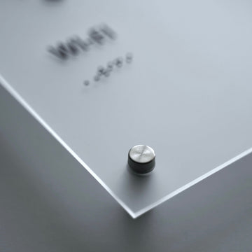 a close up of a button on a white surface - Photo #8