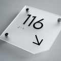 a close up of a sign on a table - Photo #9
