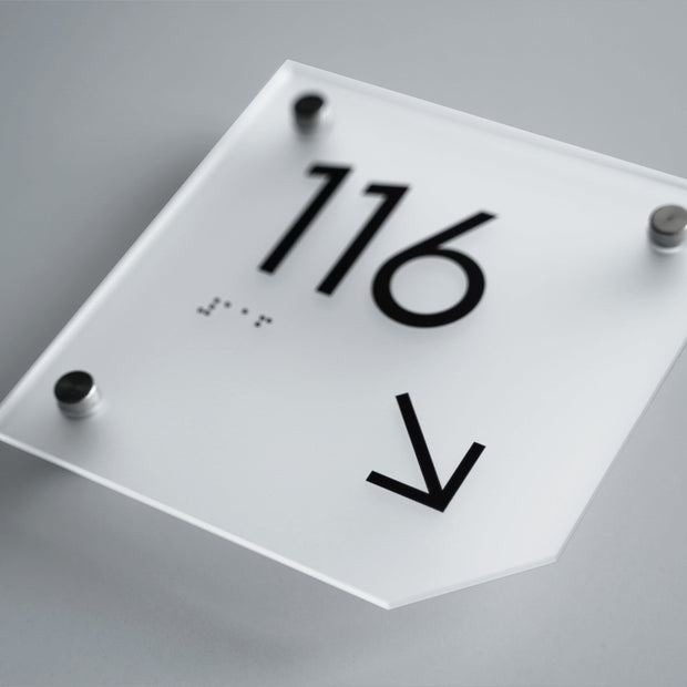 a close up of a sign on a table
