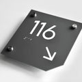 a close up of a sign on a white surface - Photo #8