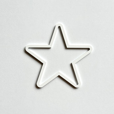 A white star shape is centered against a plain white background.