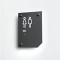 a black and white sign on a white wall - Photo #5