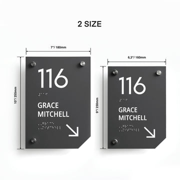 a pair of black and white street signs on a wall - Photo #11