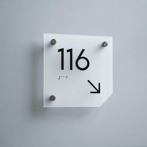a square white clock with black numbers on it