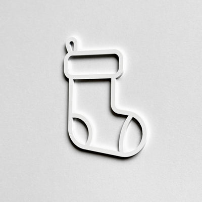 A simple white outline of a stocking on a plain white background.