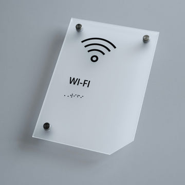 a white sign with a wifi symbol on it - Photo #6