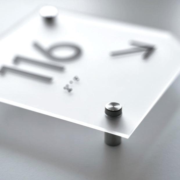 a close up of a clock on a table