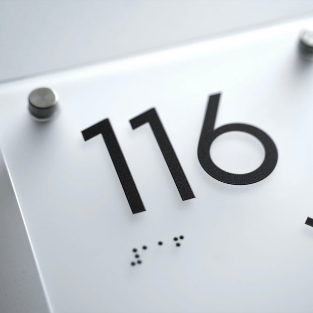a close up of a sign with numbers on it