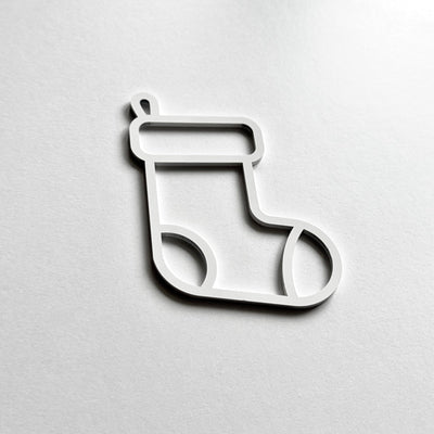 A simple white outline of a stocking on a plain white background.