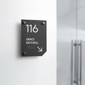 a black and white sign on a white wall - Photo #10