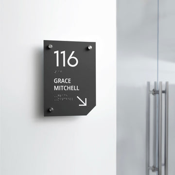 a black and white sign on a white wall - Photo #10