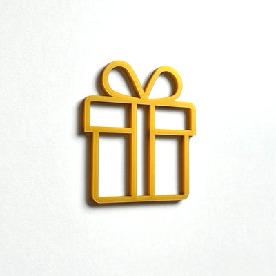 A simple gold-colored gift box icon is displayed against a white background.