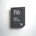 a black and white sign on a white wall - Photo #4