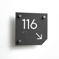 a close up of a street sign on a wall - Photo #3