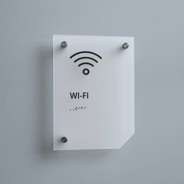 a white sign with a wifi symbol on it - Photo #3